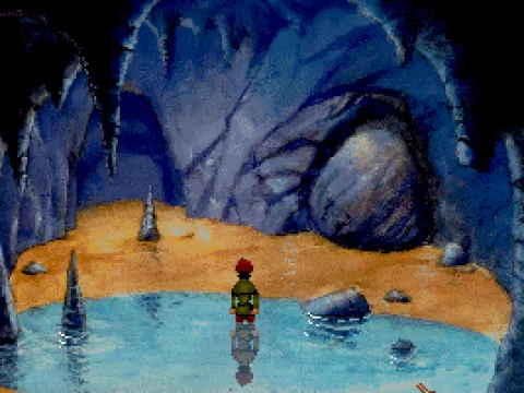 Exploring a cave. Note the nice reflection in the pool.
