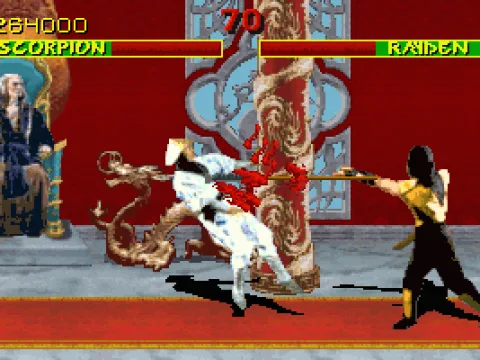 Raiden tastes the pain caused by Scorpion's deadly spear