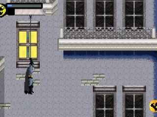 With the grappling beam, Batman can access high places and go ahead.