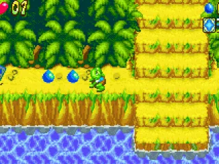 Get 20 blue drops to get an extra life, and get 4 magic cards (far left) to open a warp to a bonus level