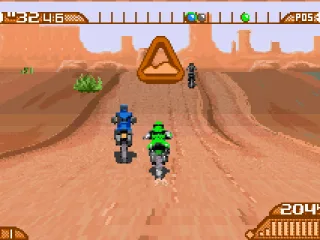 About to pass an opponent over a hill on the Kenya track.