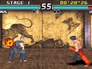 Paul preparing a Burning Fist attack to Jin who's crouching.