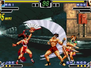 Mai hits Moe with her fan half-circle move Night Plover: she's still assisted by Joe's fast punches.