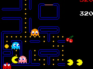In a bad moment, Pac-Man is surrounded by Inky, Blinky, Pinky and Clyde: you'll lose one life... :-(