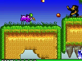 Monkeys roll coconuts at you. You loose a life if they hit you.