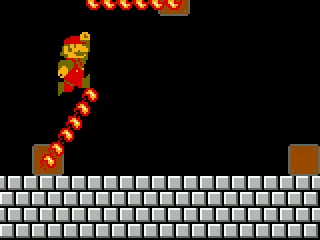 During his way through Level 1-4, Mario tries a risky jump between two fire chains.