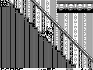 Dennis goes down the stairs.