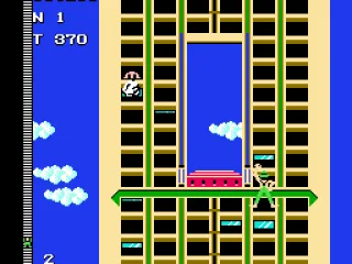 A bald-headed guy shows his face and throws something