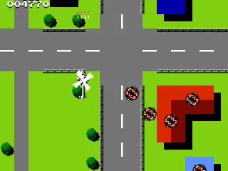 Passing by buildings, most of which explode when fired upon