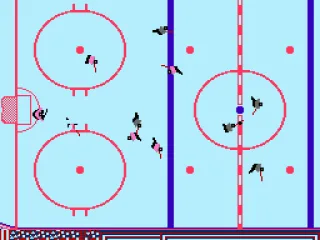 MacTavish has the puck