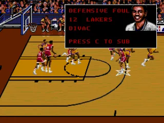 Vlade Divac makes a defensive foul
