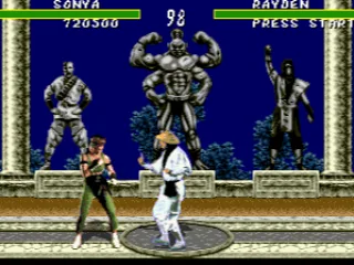 The muscle-man in the background cheers Rayden