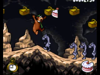 Yogi tries to jump above another row of weasels, but this time he's damaged!