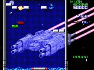 A battle rages on in the background while blocks are attacked in the foreground