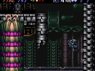 Hagane jumps off a wall. The giant worms respawn constantly.