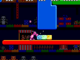 Using the hammer power-up to smash blocks.