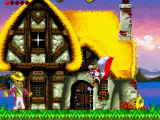 In front of a house, dodging the attack of the scarecrow