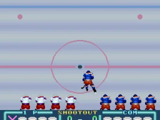 A player heads towards the goal during a shootout