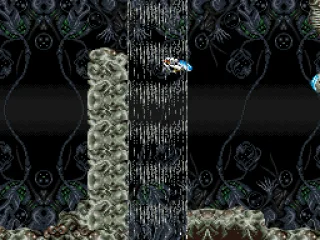Organic-themed stage with waterfalls.