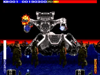 Fighting the HK Tank boss at the end of the first level.