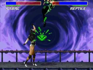 Kabal hits Reptile with a furious uppercut (btw Reptile is the only character with green blood)